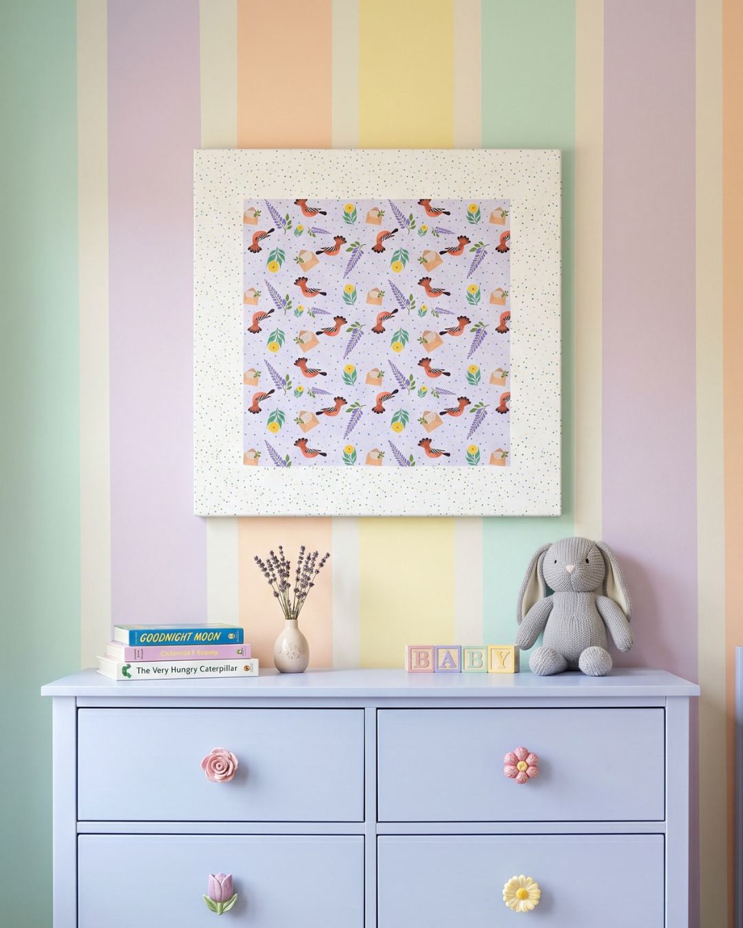 Islamic nursery wall art canvas with Hudhud (Hoopoe) bird pattern styled in a pastel striped children’s room