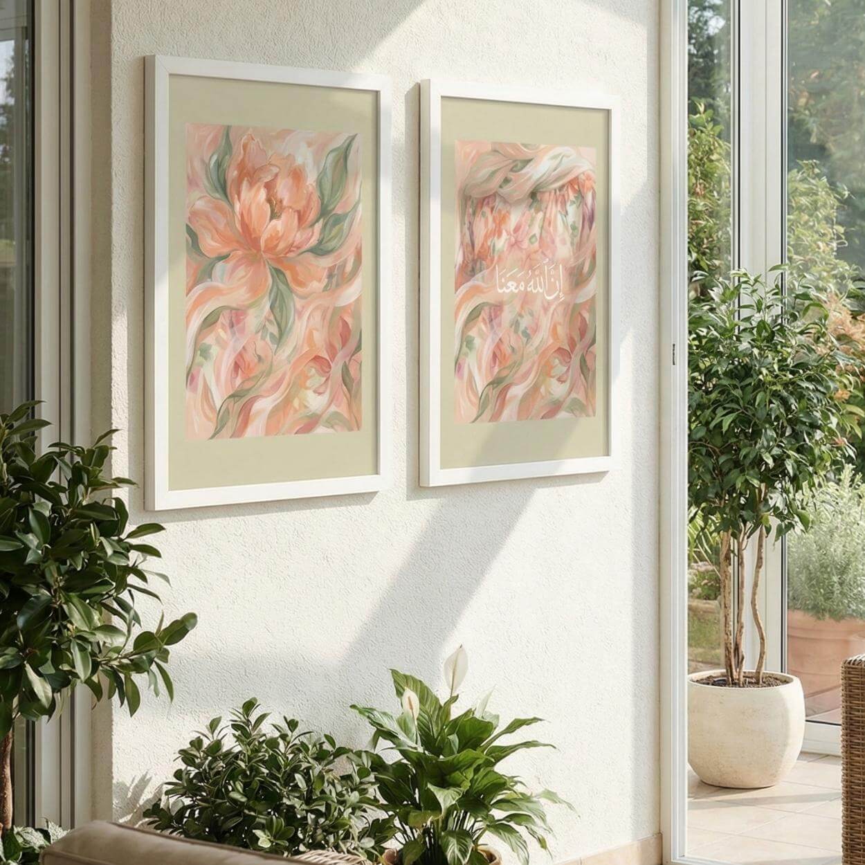 Set of two soft floral Islamic printable wall art pieces displayed in white frames, including a botanical floral artwork and إِنَّ اللَّهَ مَعَنَا Arabic calligraphy print