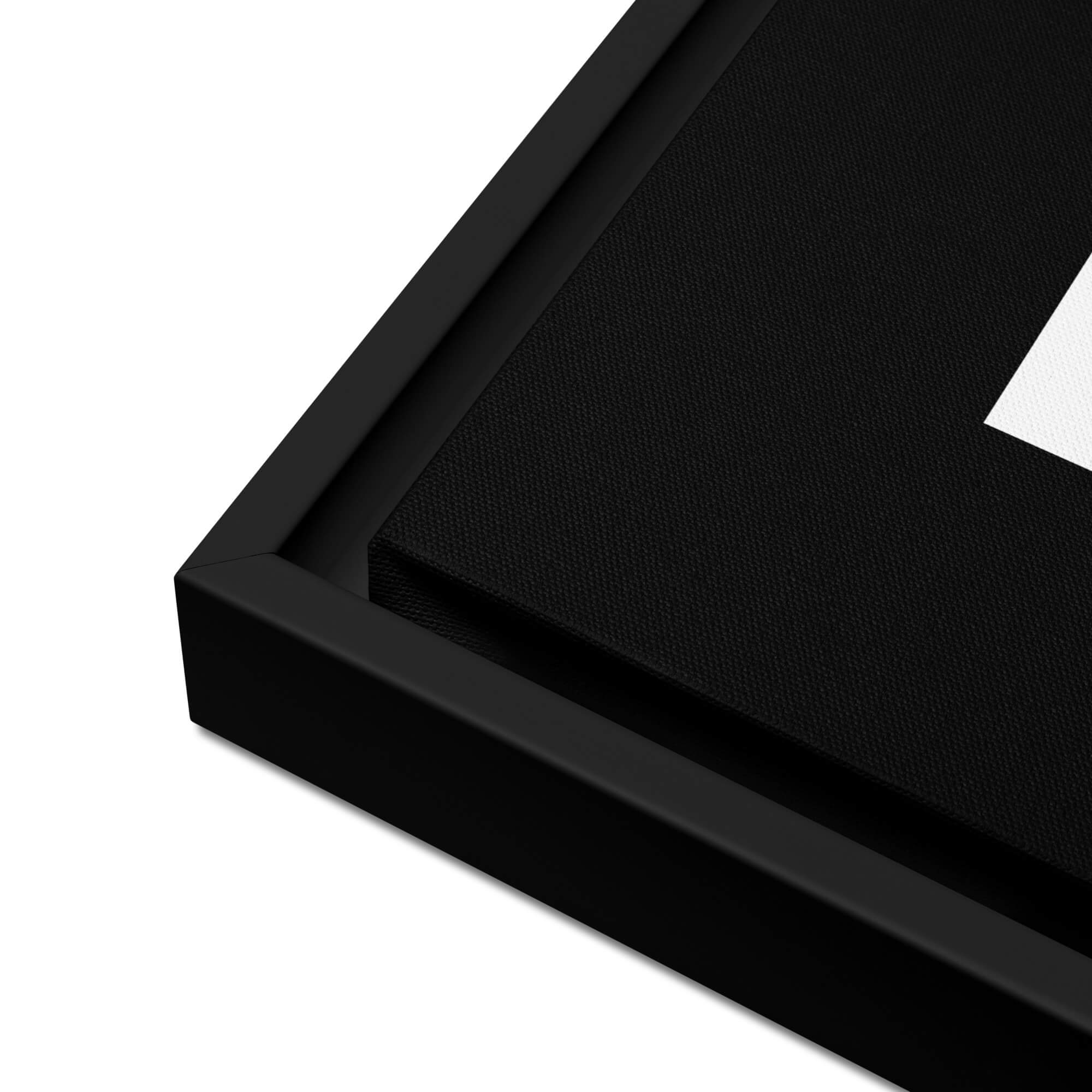 Close-up of a black floating frame corner on a white background